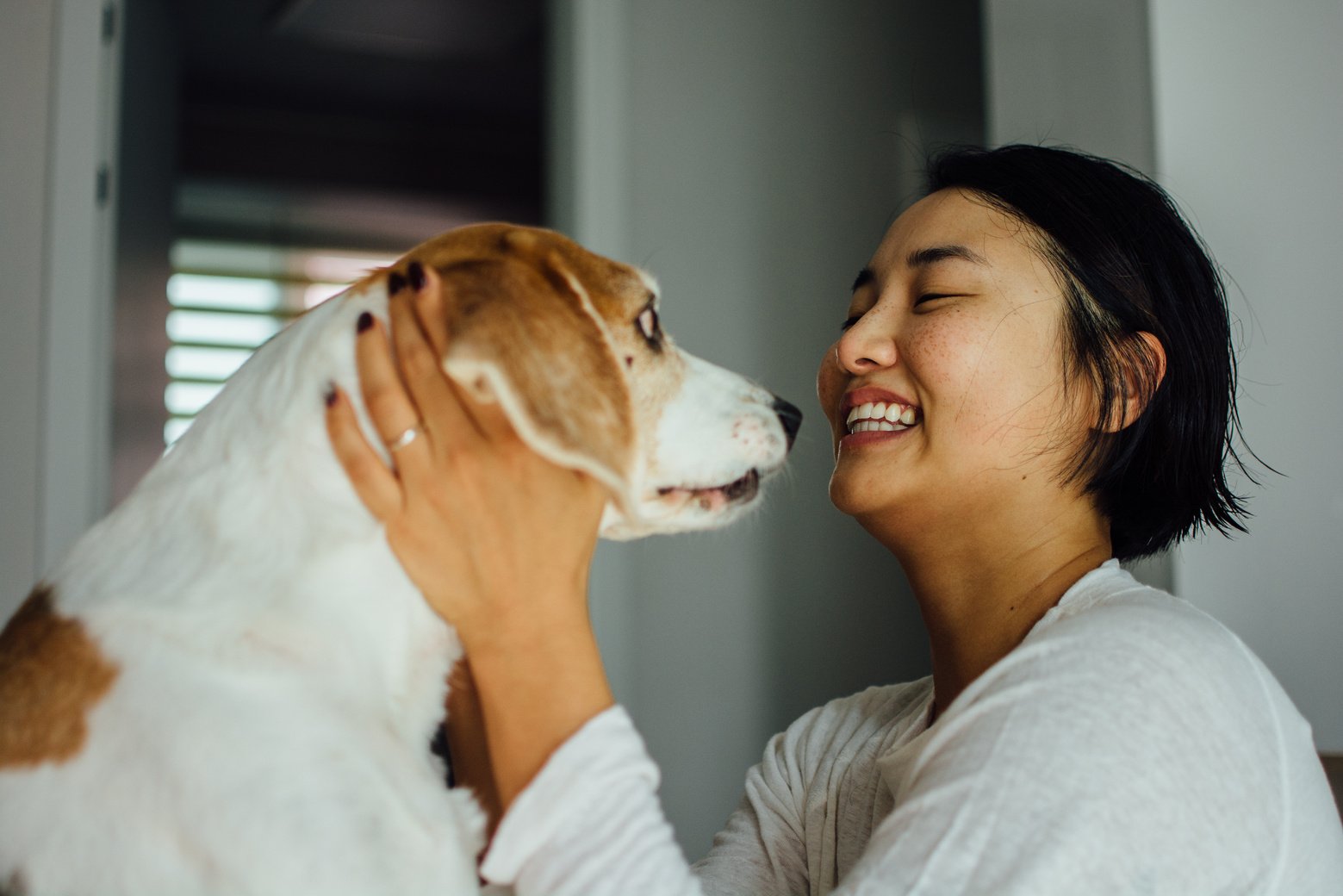 Woman Playing with Her Dog